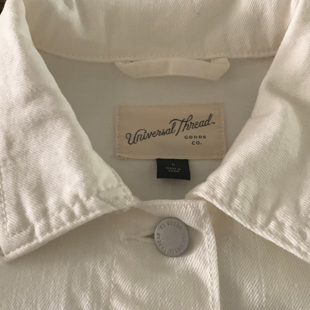 White jean jacket size small. Great condition.  Worn only a few times.